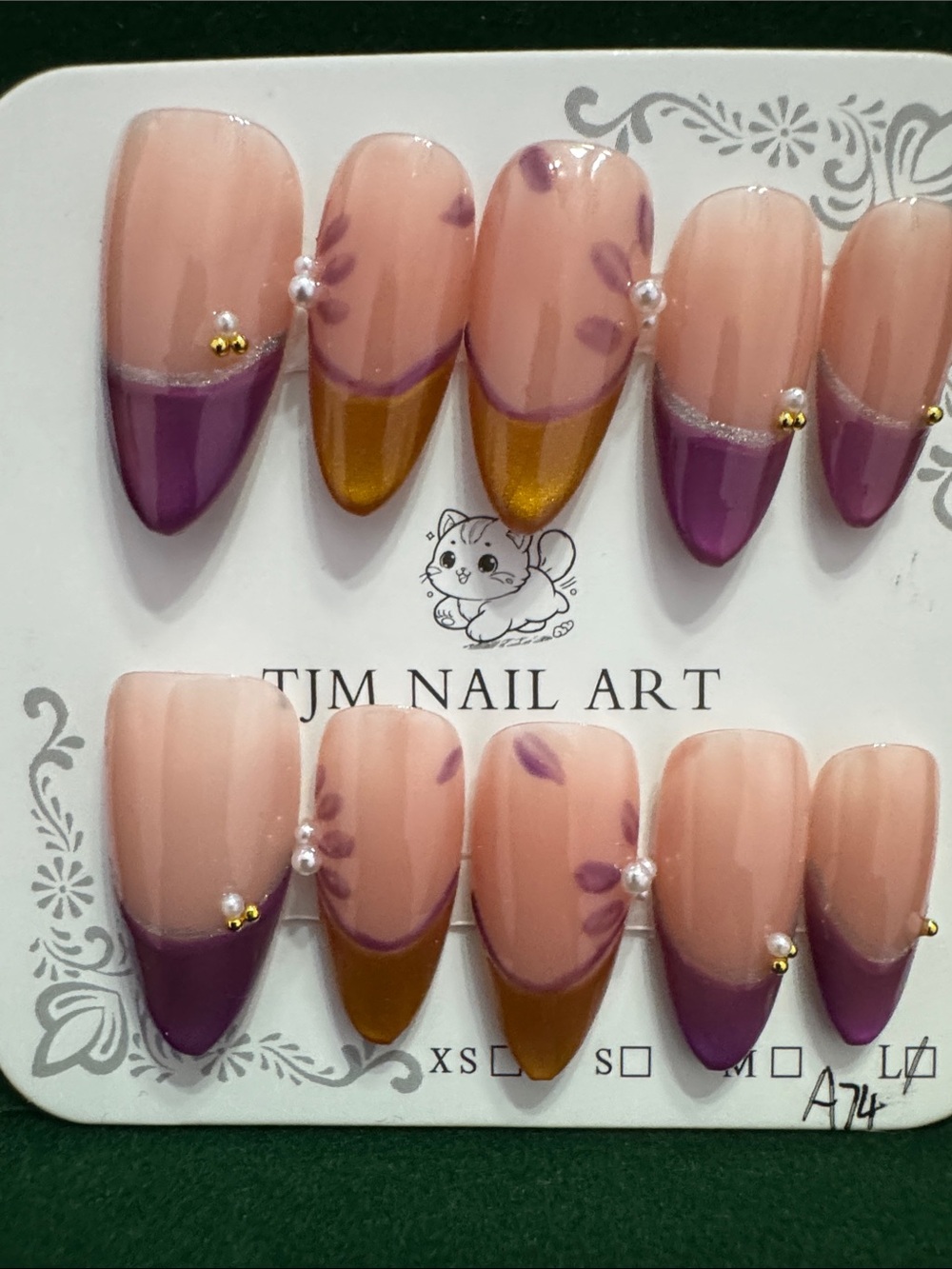 Hand-Painted Nude Press-On Nails with Purple & Gold Tips